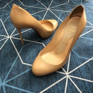 Nude Christian Louboutin décolleté heels